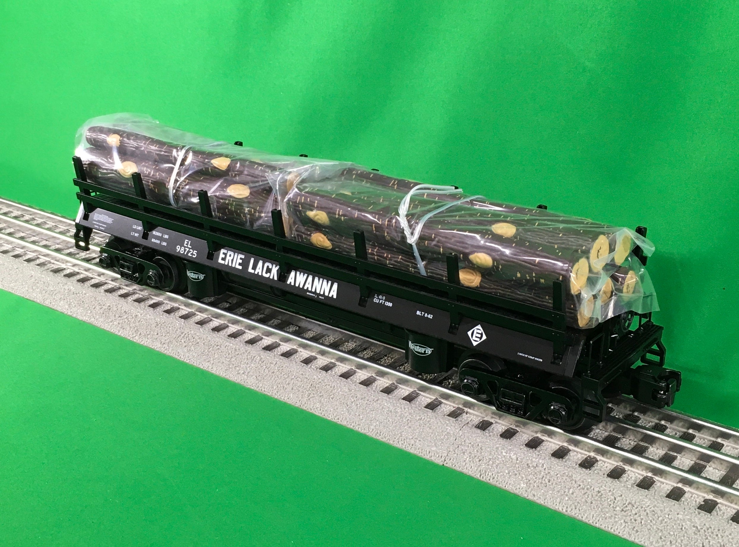 Atlas O 3001163 - Premier - Log Dump Car "Erie Lackawanna"