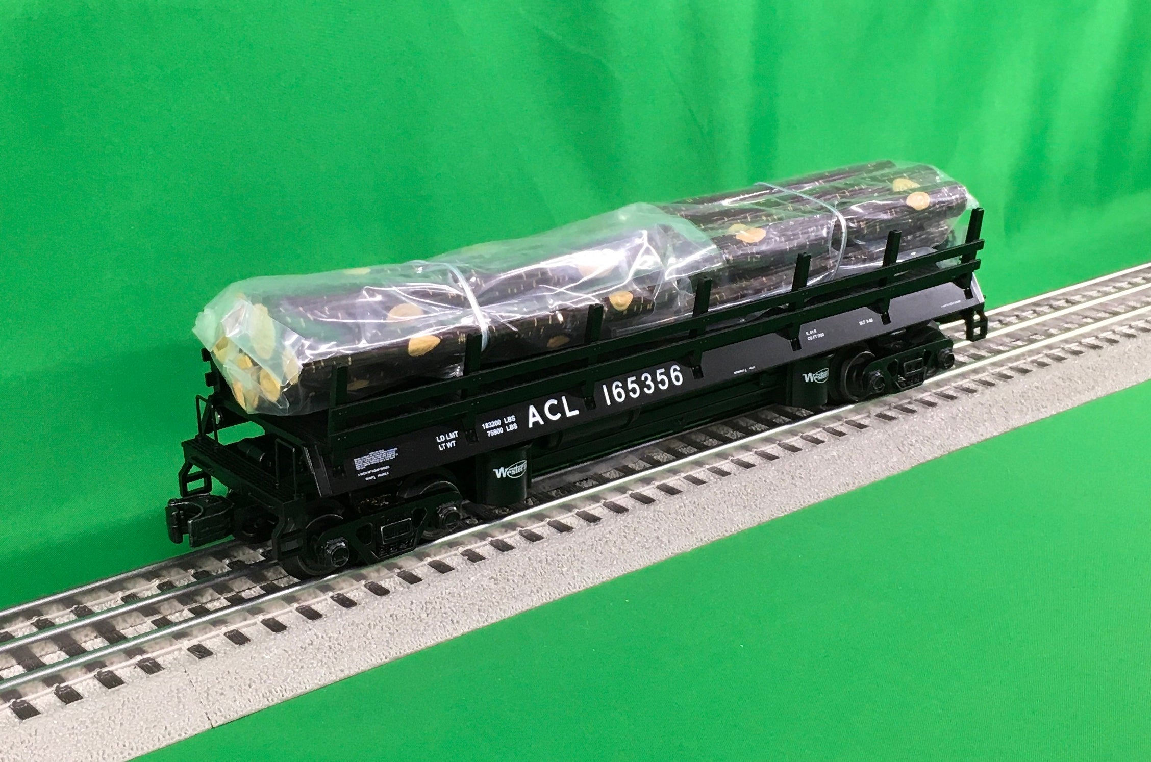 Atlas O 3001162 - Premier - Log Dump Car "Atlantic Coast Line"