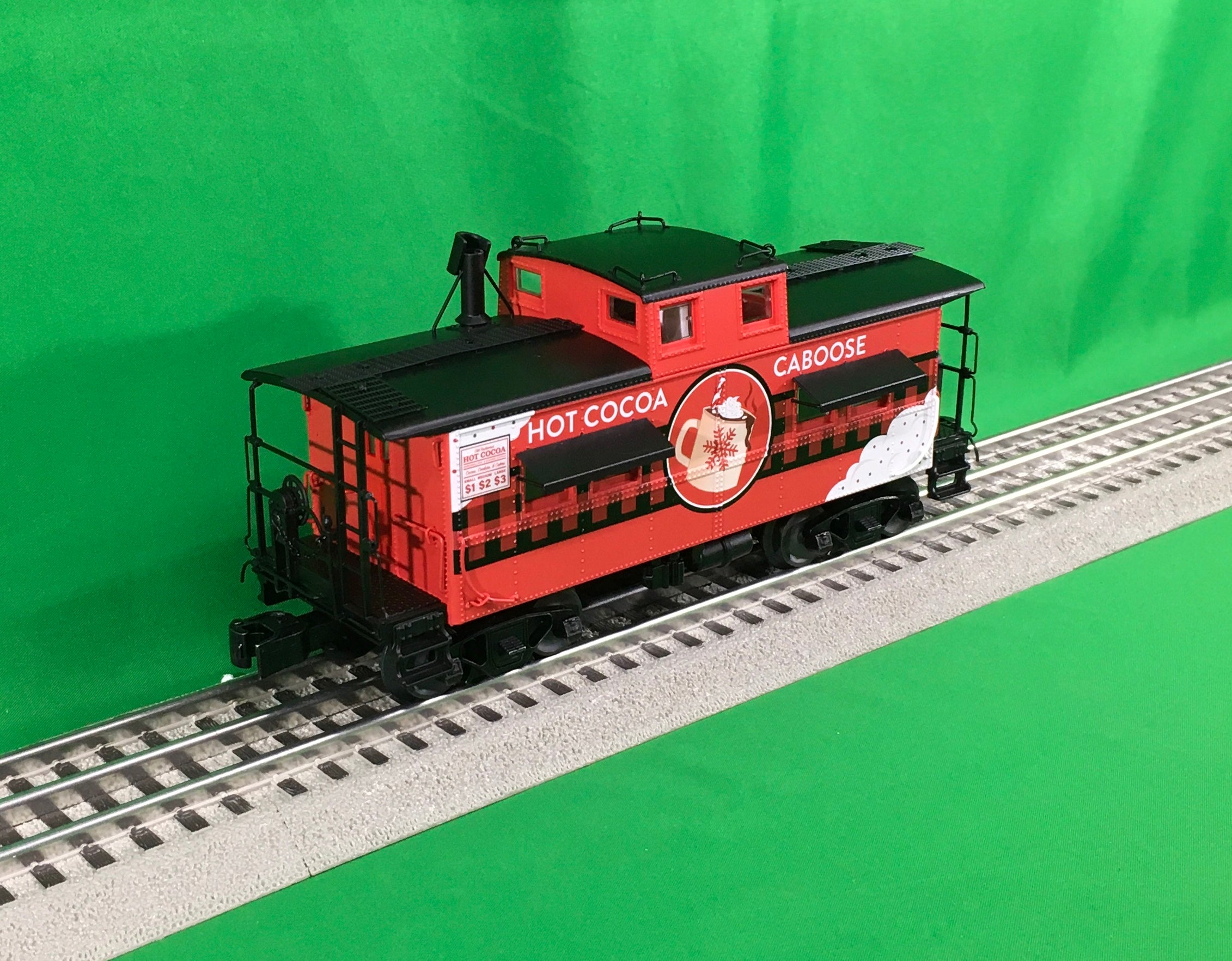 Lionel 2329170 - Hot Cocoa NE Caboose w/ Deck