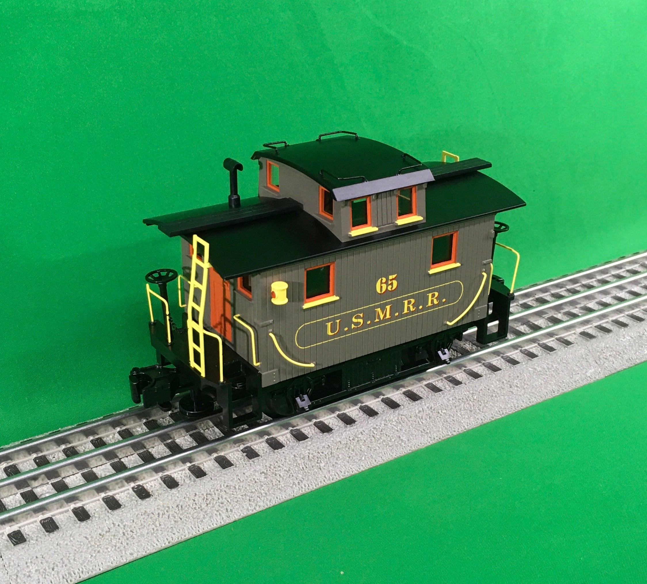 Lionel 2226740 - Bobber Caboose "U.S. Military RR" #65