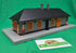 MTH 30-90760 - RailKing - Country Passenger Station "Transylvania" w/ Orange Lights