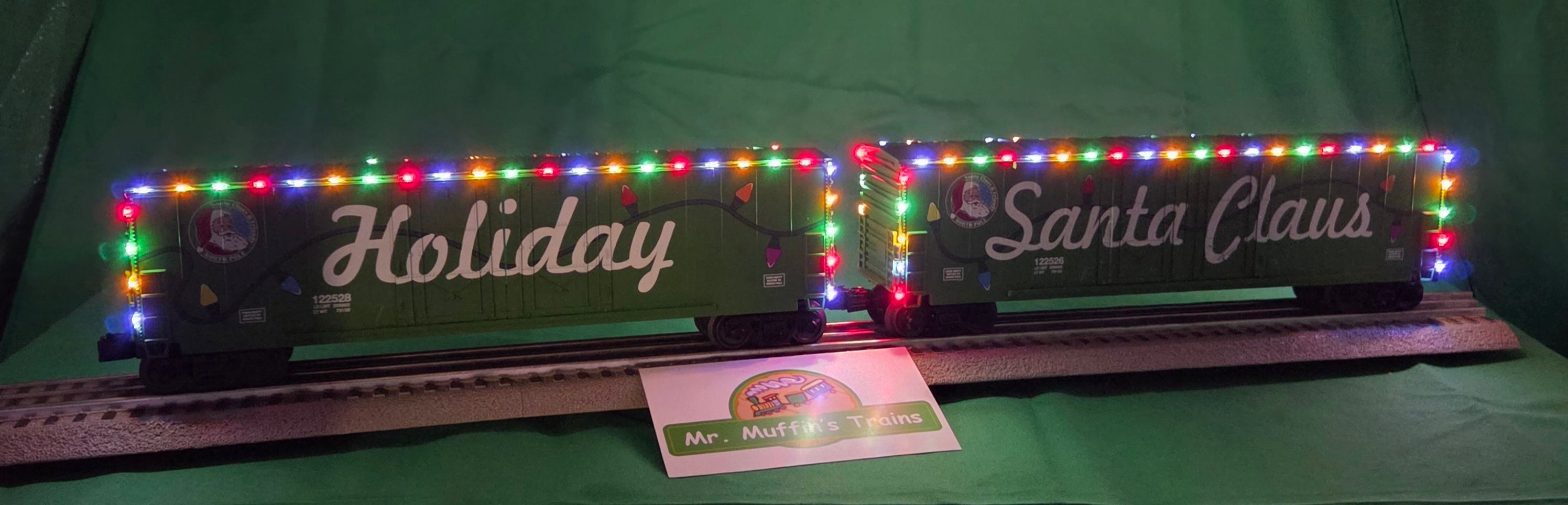 MTH 30-70170 - RailKing - 50’ Double Door Plugged Boxcar Set "Christmas" w/ LED Lights Set (4-Car)