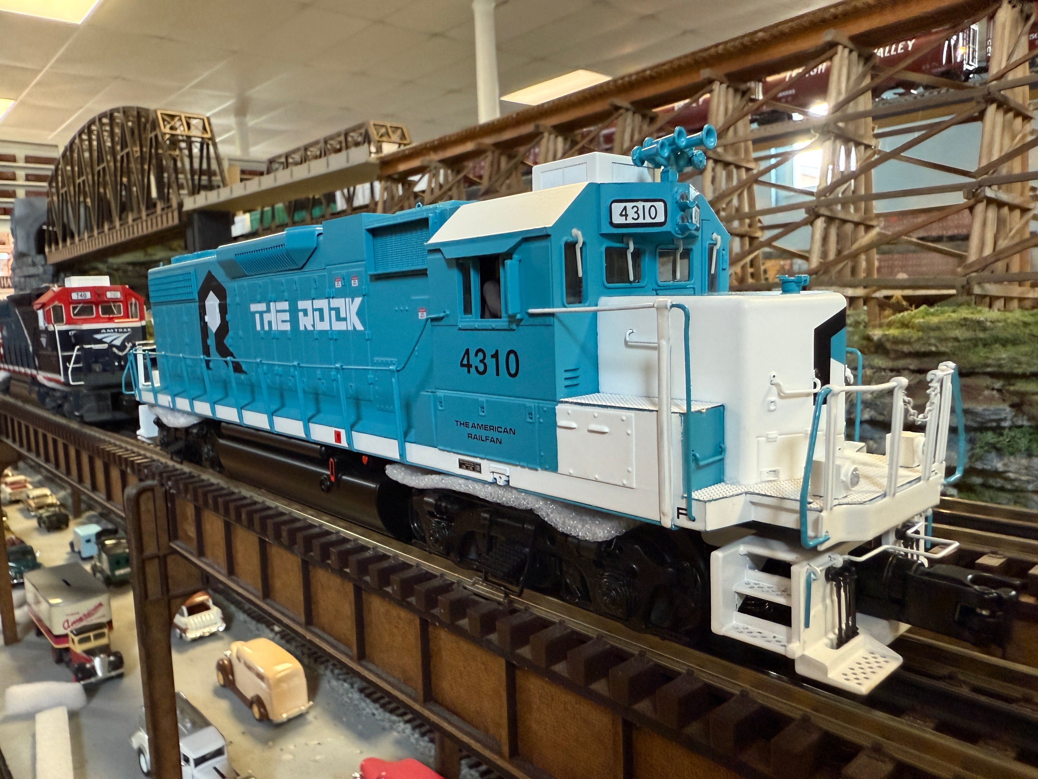 Atlas O 30138351 - Premier - GP38-2 Diesel Locomotive "Rock Island Rail" #4310 (The American Railfan)