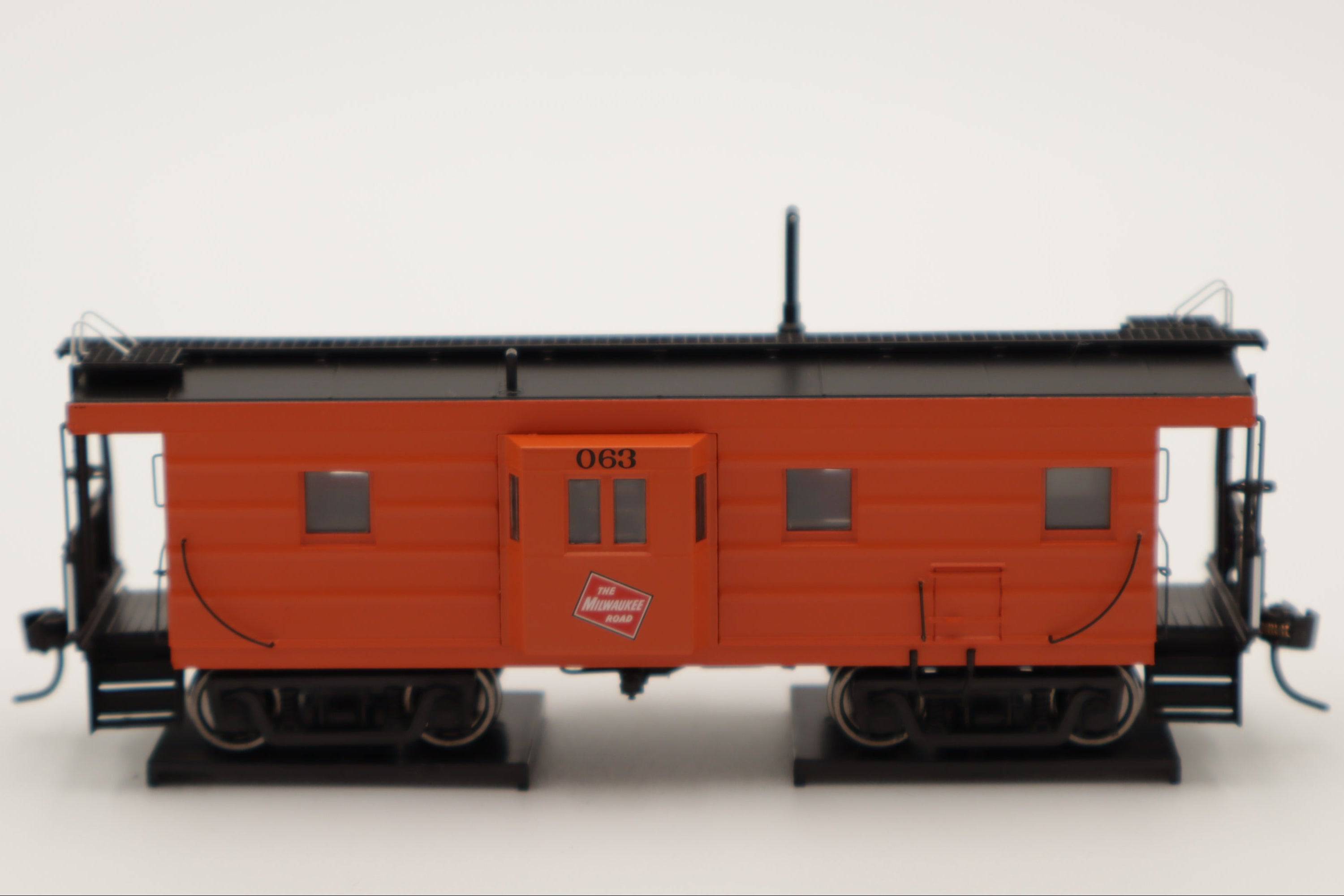 Walthers HO 920-103658 - Proto -  Rib Sided Caboose "Milwaukee Road" #071 (Orange, Black; Includes Oil Stove)