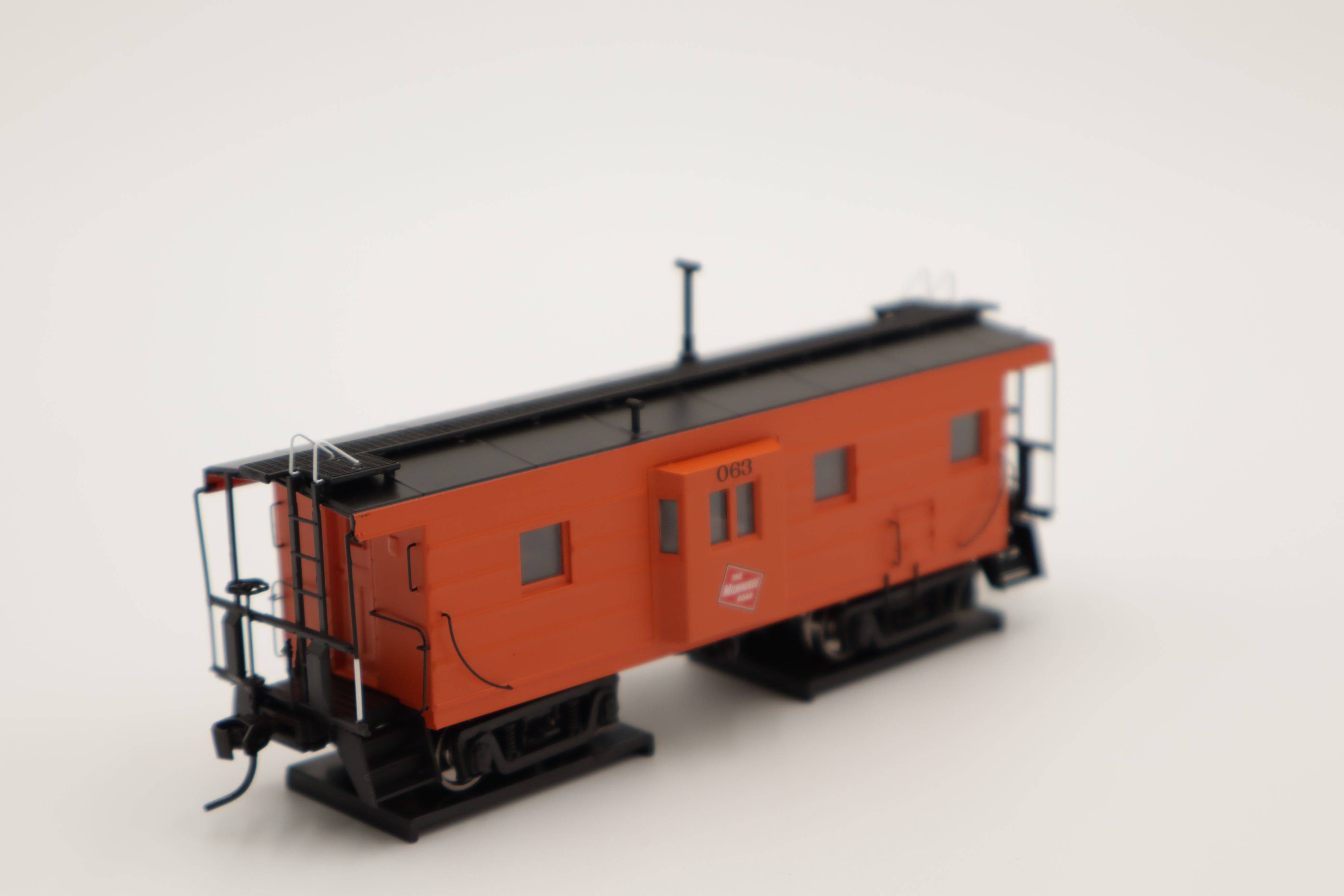 Walthers HO 920-103658 - Proto -  Rib Sided Caboose "Milwaukee Road" #071 (Orange, Black; Includes Oil Stove)