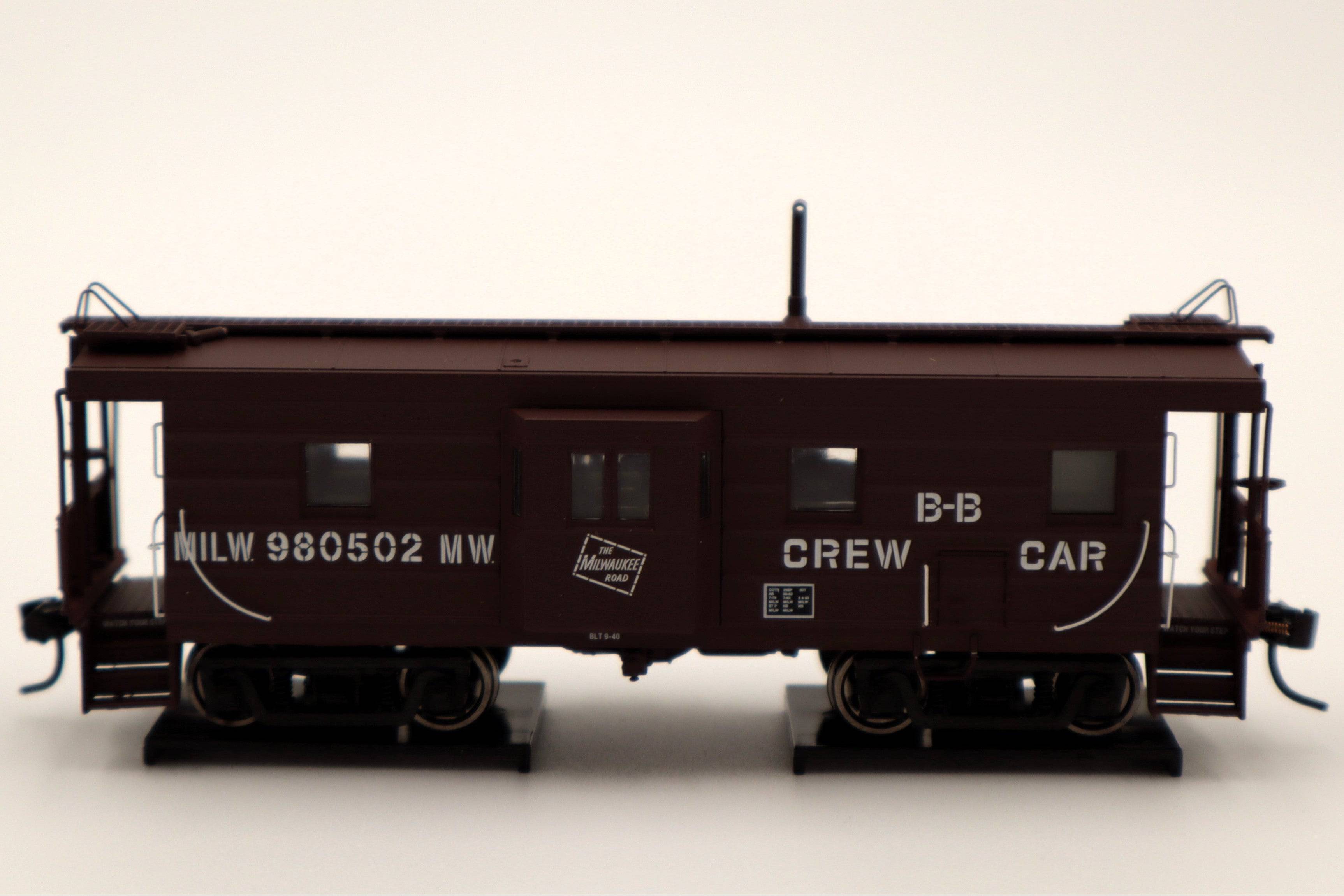 Walthers HO 920-103659 - Proto -  Rib Sided Caboose "Milwaukee Road" #980502 (Tuscan, Black, White; Includes Oil Stove) Buildings & Bridges