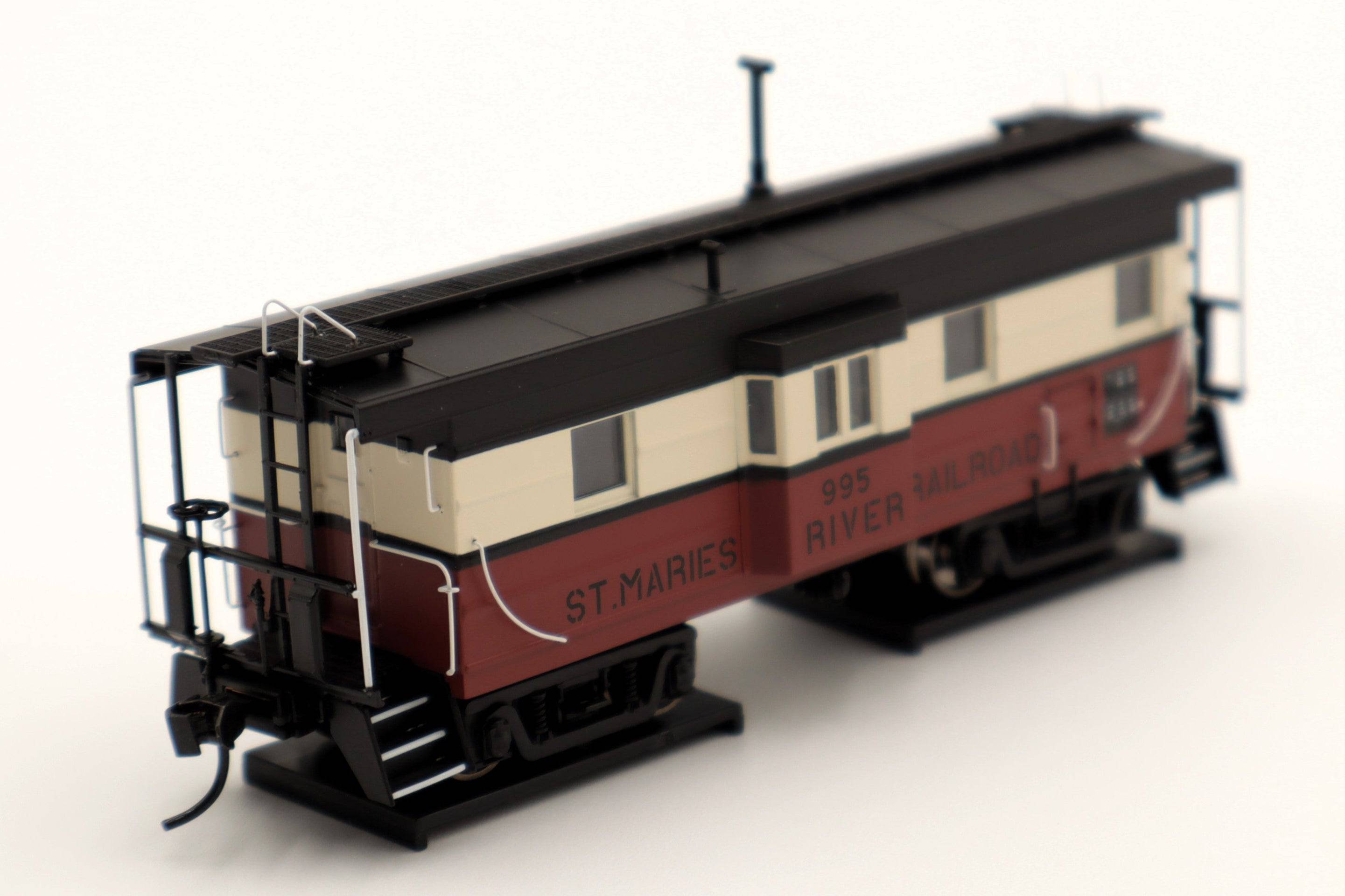 Walthers HO 920-103660 - Proto -  Rib Sided Caboose "St. Marie's River Railroad" #995 (Red, White, Black; Includes Oil Stove)