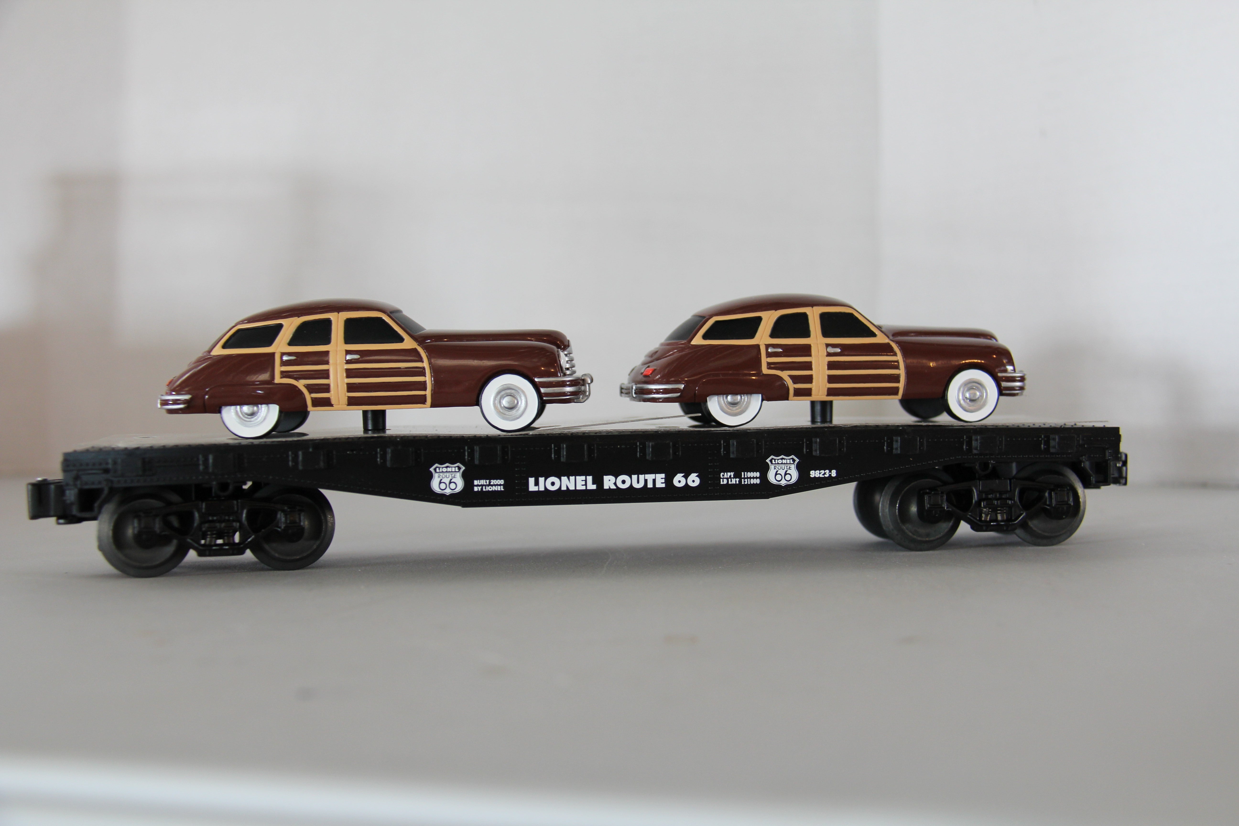 Lionel 6-17558 Route 66 Flat Car w/ 2 Brown Sedans-Second hand-M3649