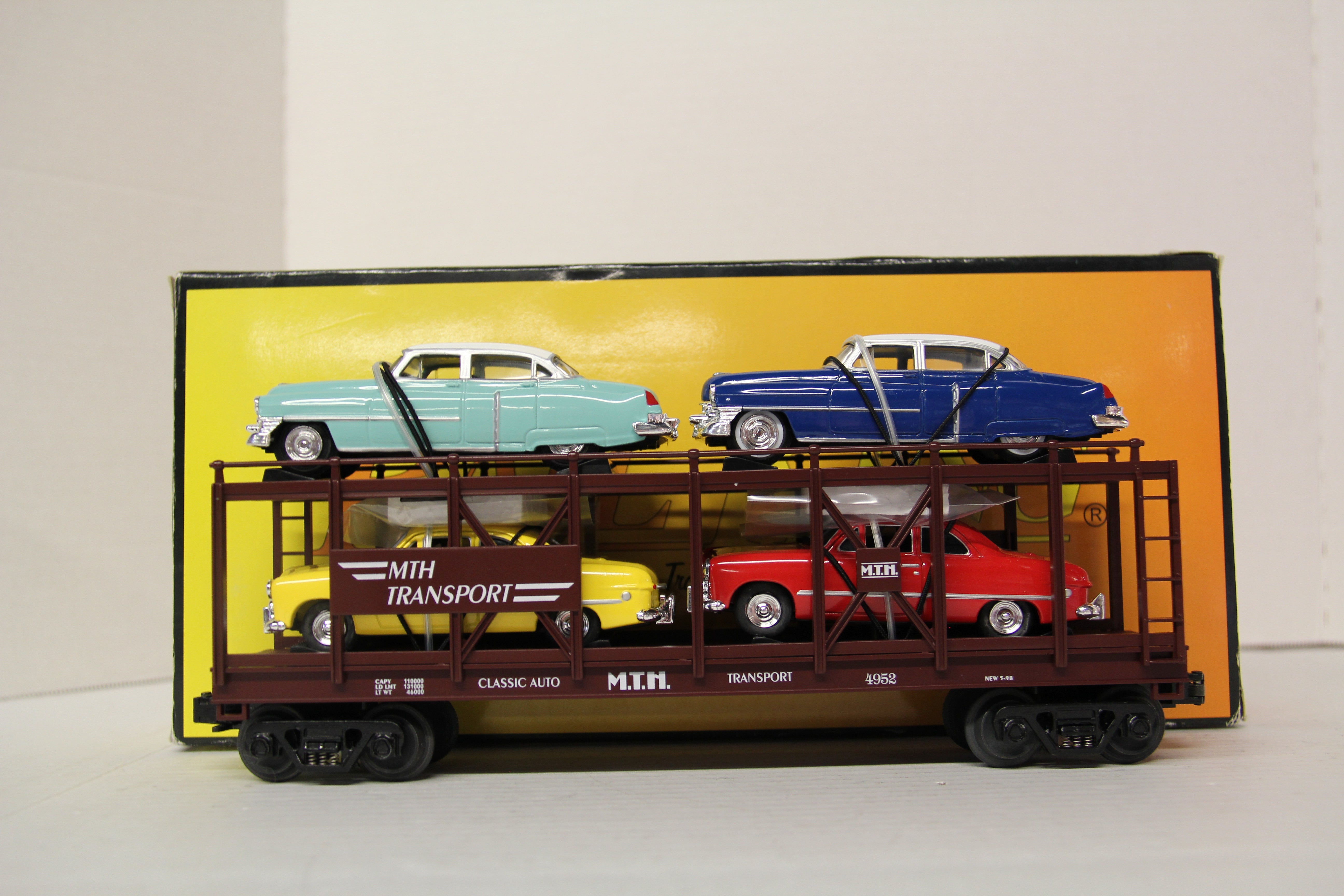 Rail King 30-7628 MTH Auto Transport Flat Car w. Ertl 1952 Cadillac & 1949 Ford Coupe-Second hand-M6249