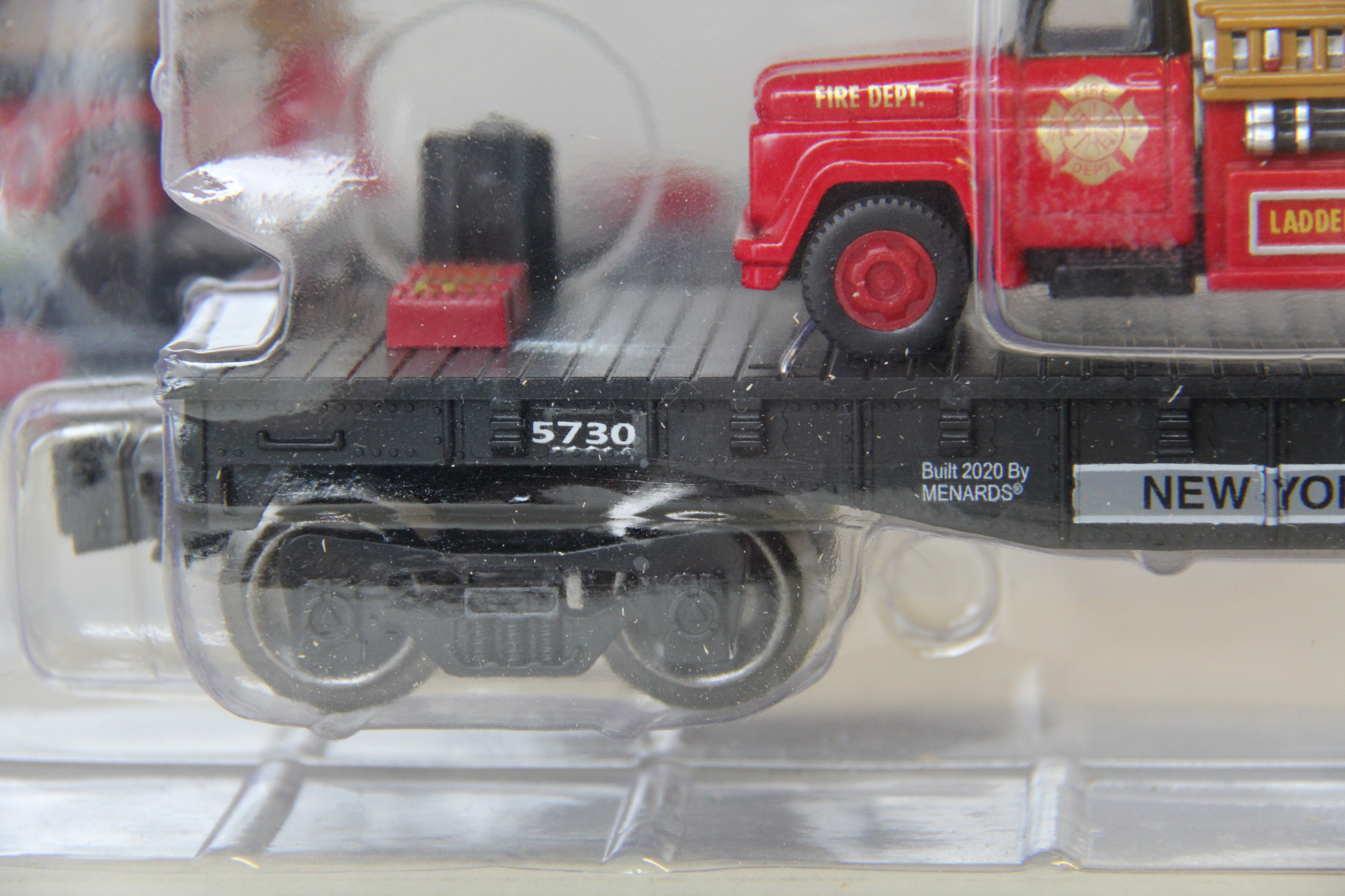 Menards 2795604 New York Central Flatcar w. Fire Truck 3 Car SetSeco