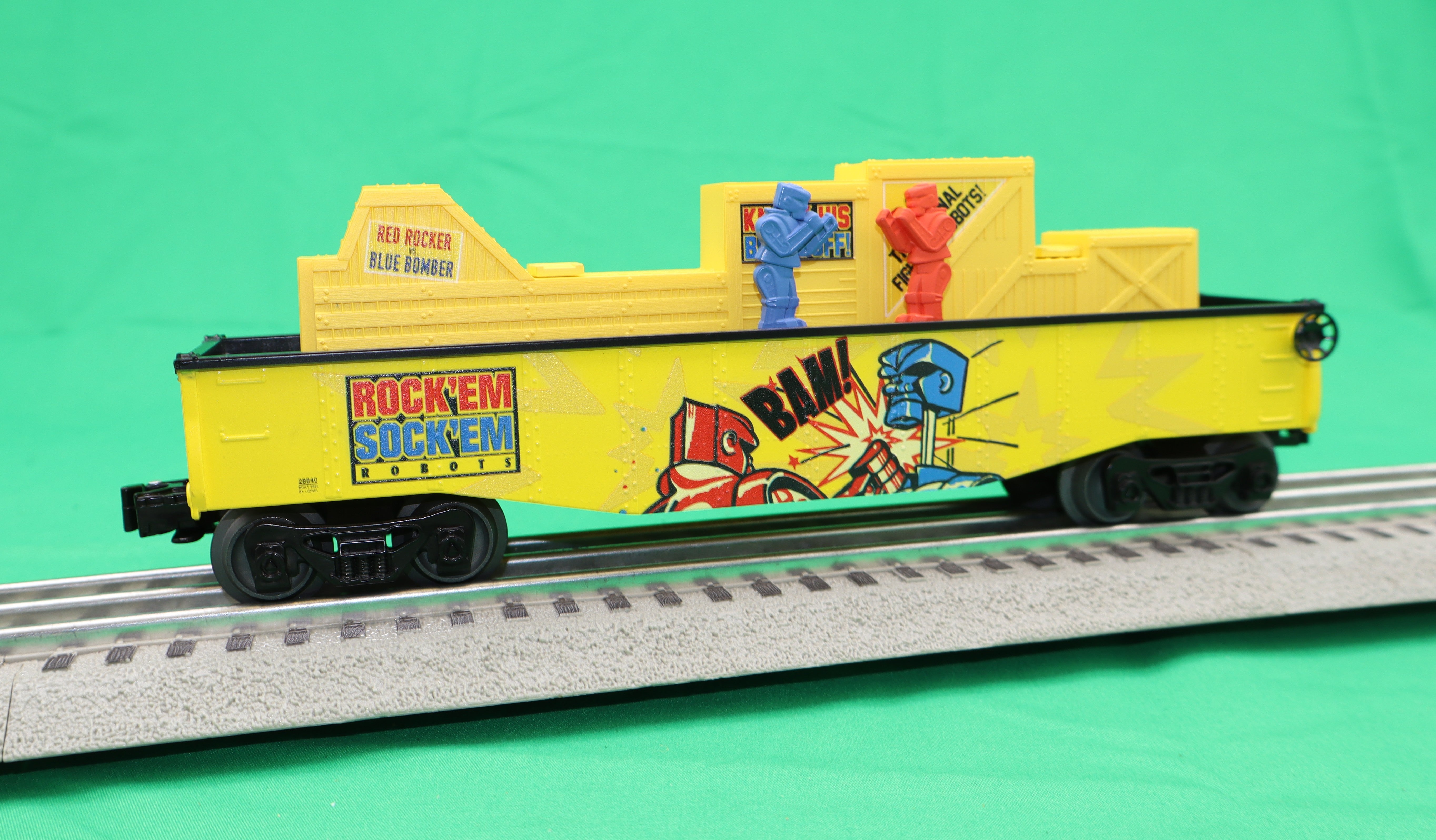 Lionel 2528840 - Chasing Gondola Car "Rock 'Em Sock 'Em Robots"