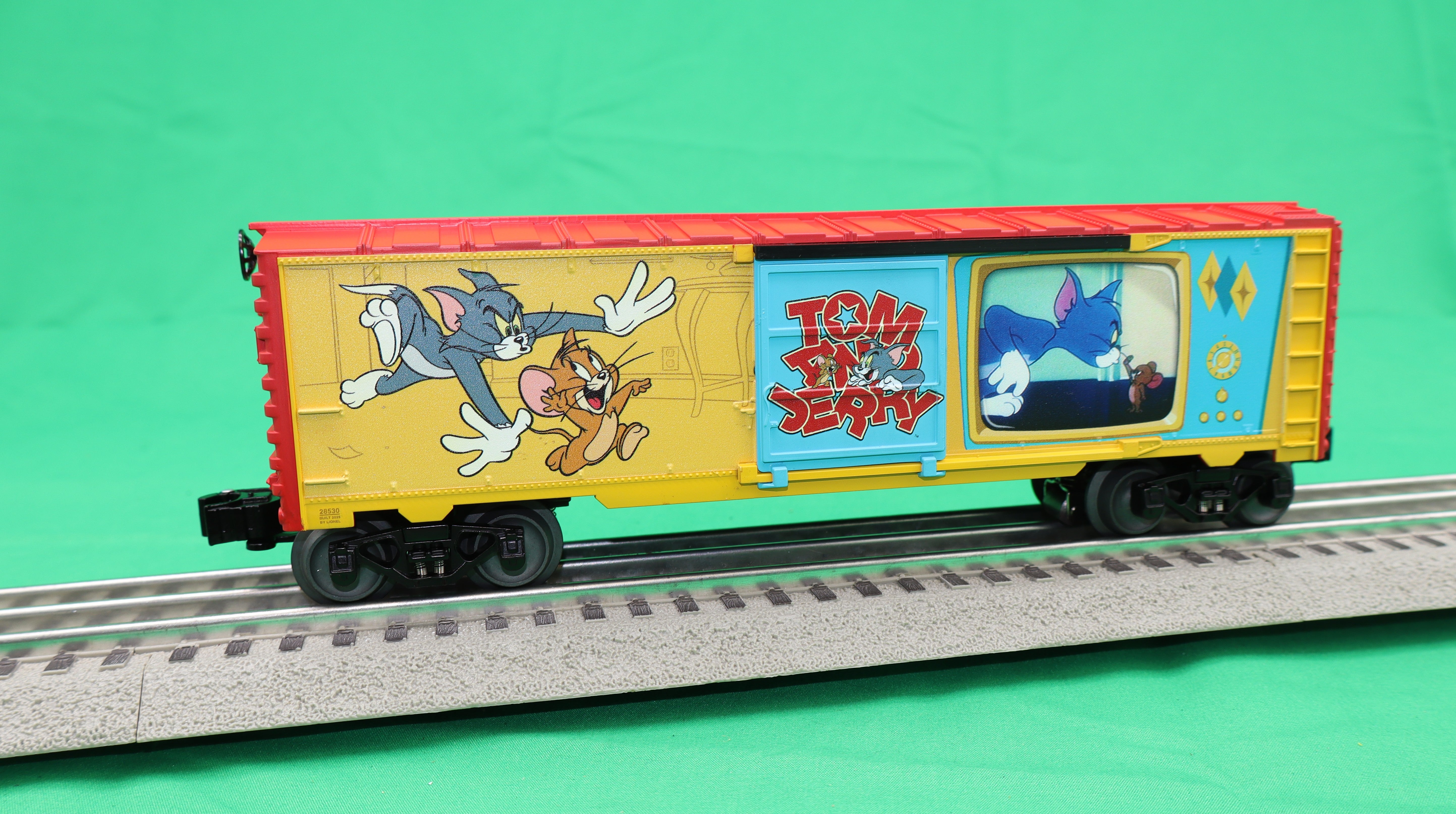 Lionel 2528530 - Illuminated Cartoon Boxcar "Tom & Jerry"