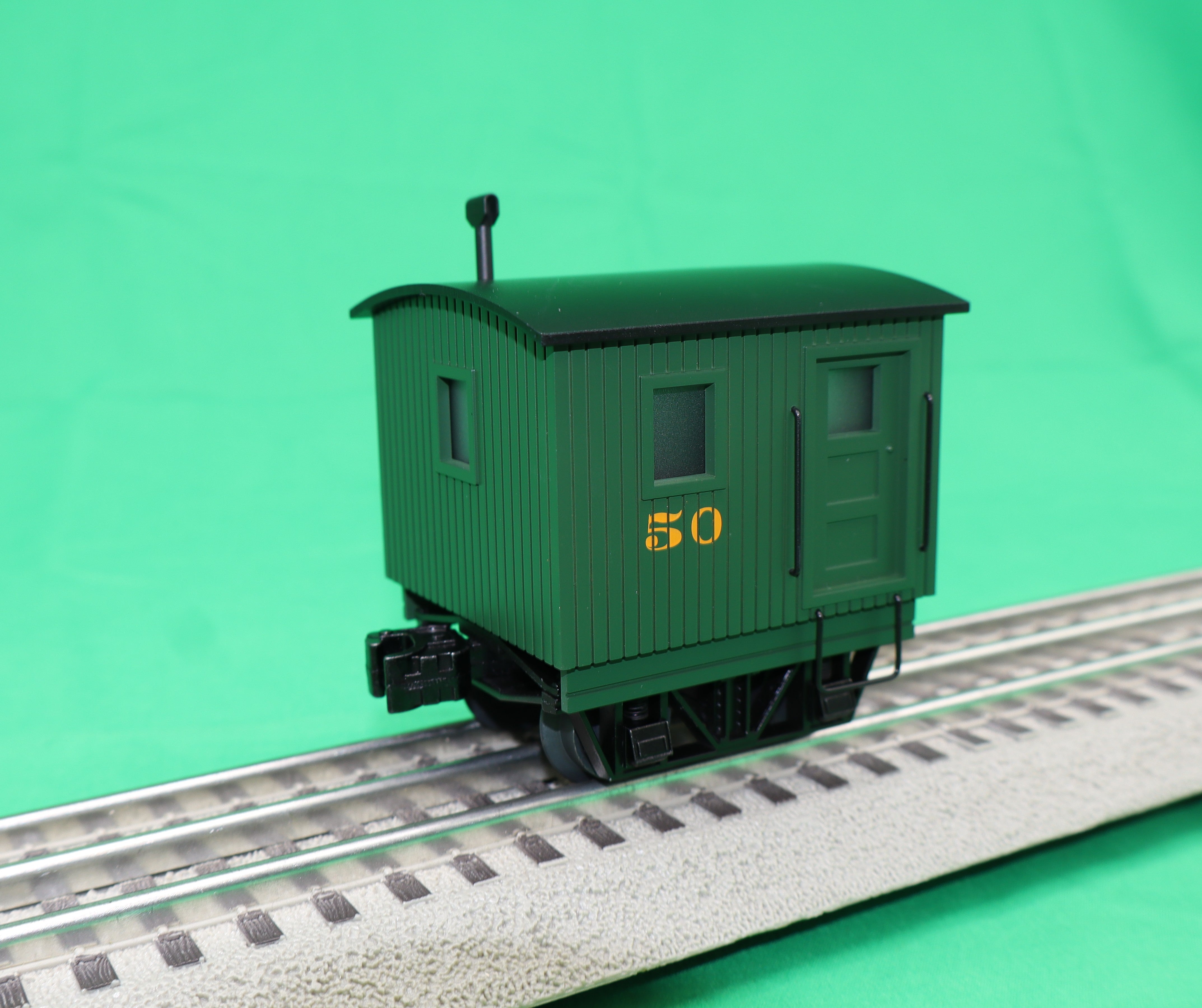 Lionel 2526750 - Disconnect Caboose Car (Green)