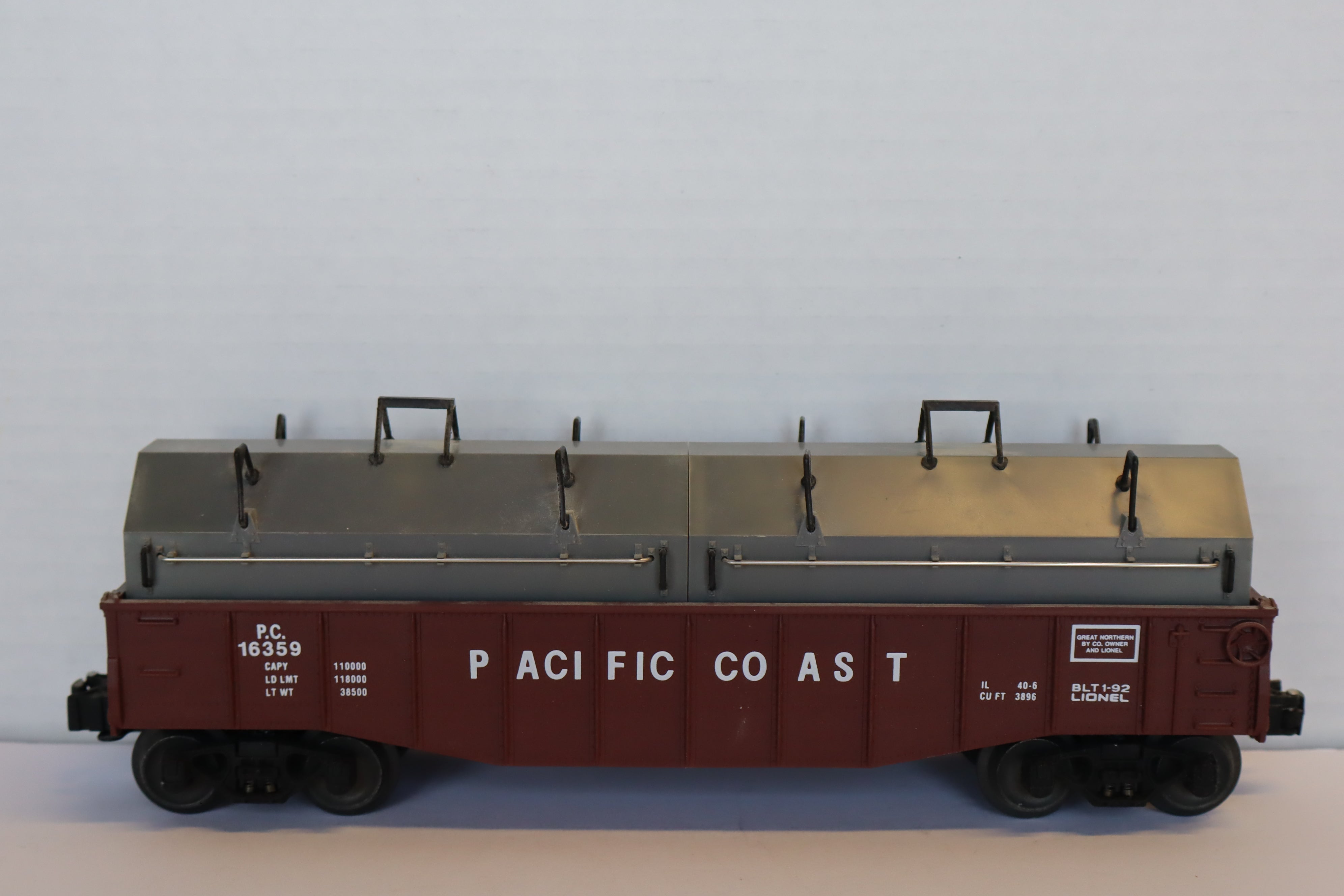 Lionel 6-16359 Pacific Coast Gondola w/ Coil Covers-Second hand-M8071