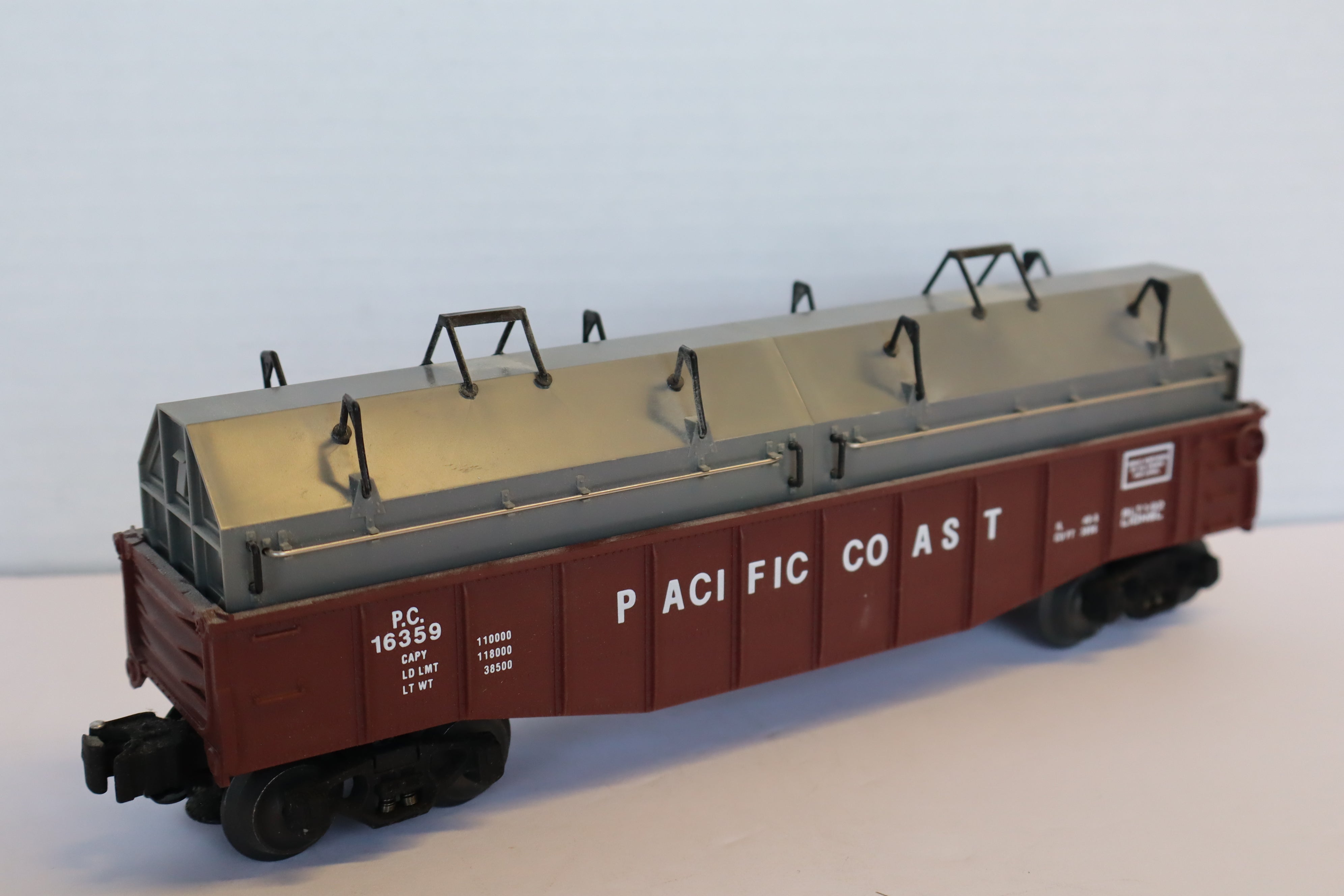 Lionel 6-16359 Pacific Coast Gondola w/ Coil Covers-Second hand-M8071