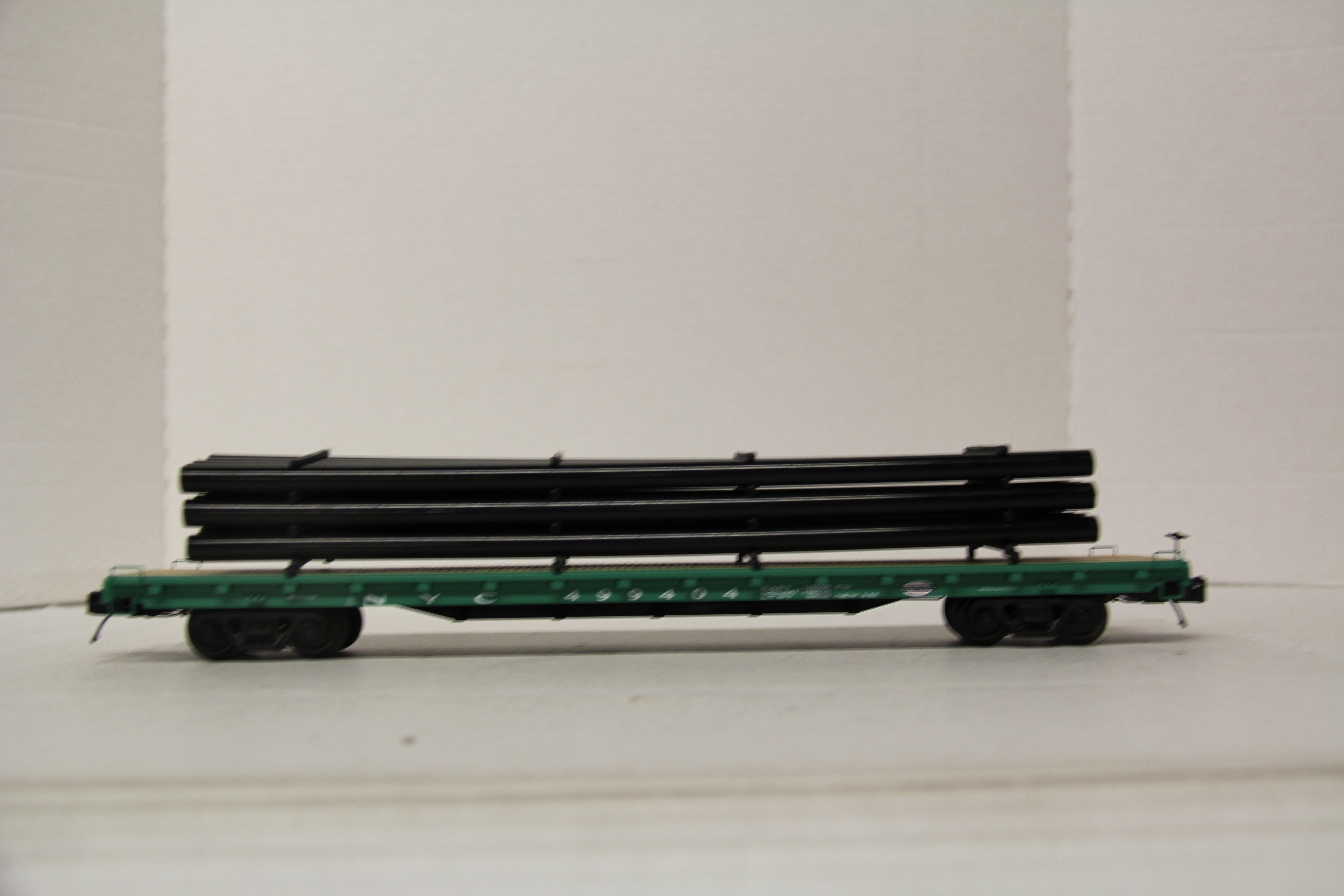 MTH 20-95606 New York Central 60' Flat Car w/ Pipe Load-Second hand-M6644