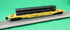 Atlas O 3001886 - Trainman - 52'6" Flat Car "Morrison Knudsen" w/ Pipe Load