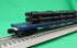 Atlas O 3001880 - Trainman - 52'6" Flat Car "Alaska Railroad" w/ Pipe Load