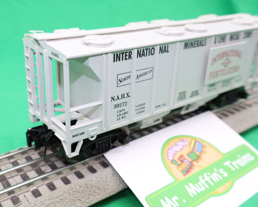 Ready Made Trains RMT-86399-102 - 2-Bay Covered Hopper Car "International Minerals"