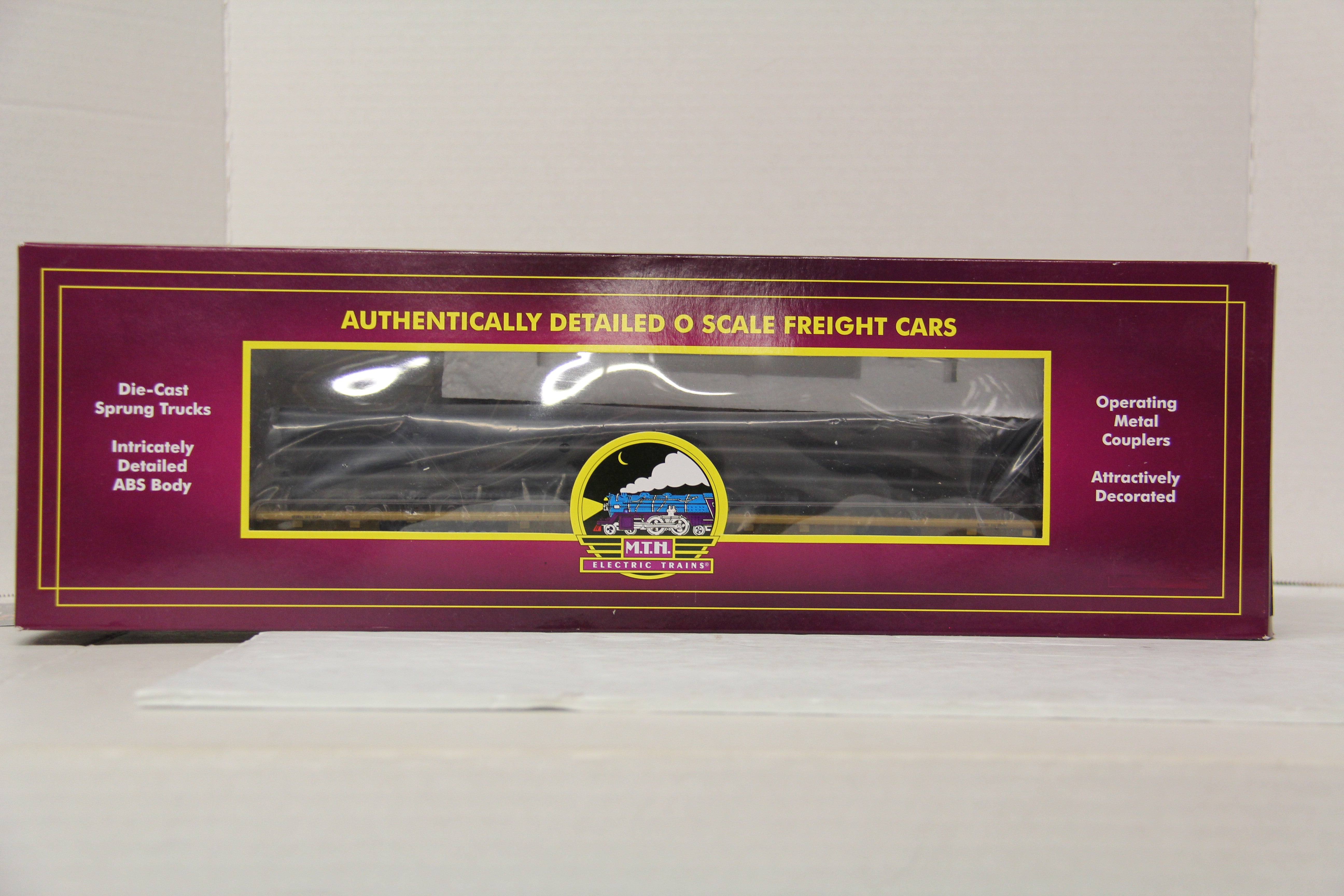 MTH 20-95324 TTX 60' Flat Car w/ Black Pipe Load-Second hand-M5479