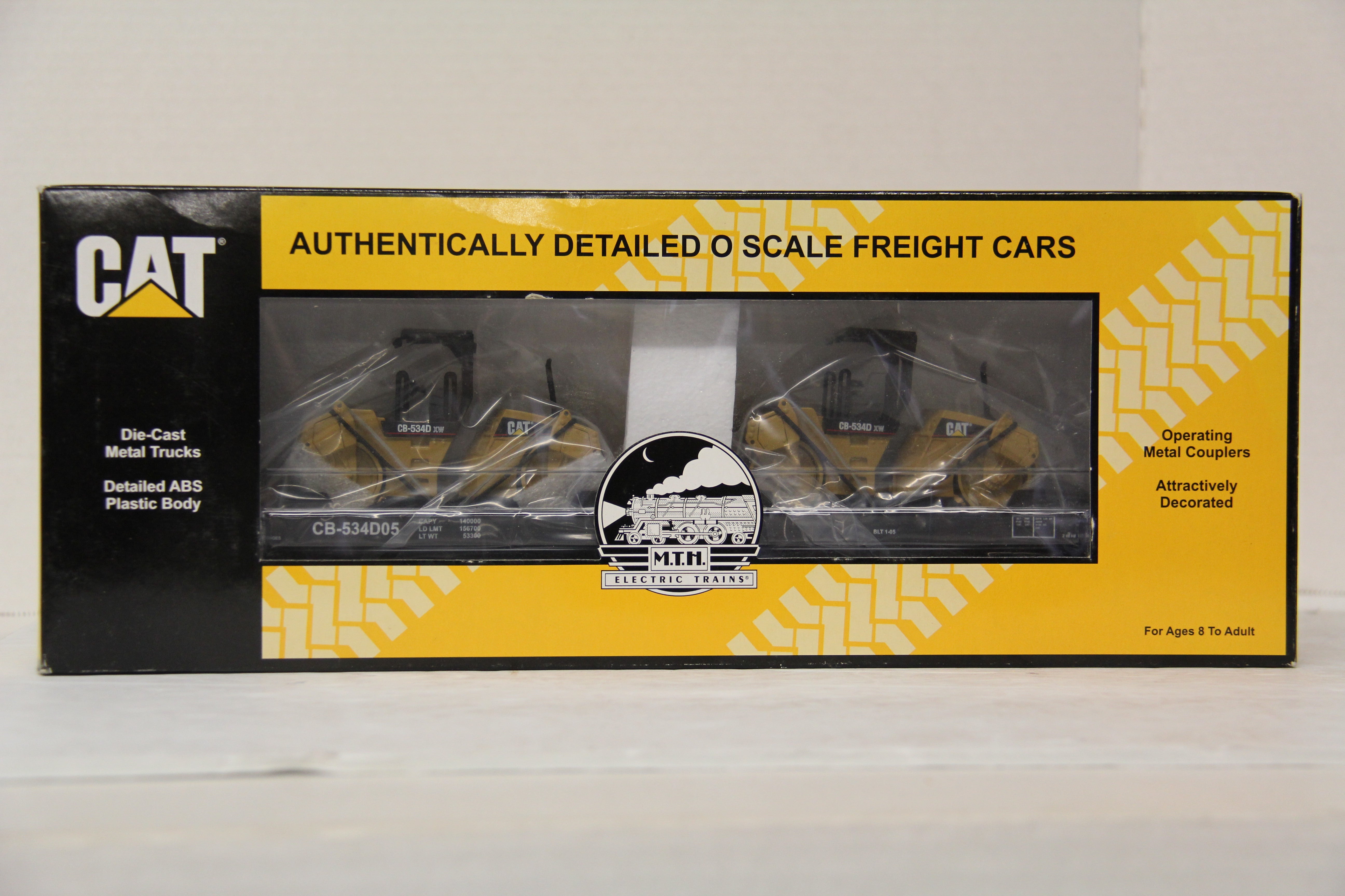 MTH 20-98496 Caterpillar CB-534D05 Flat Car w/ 2 XW Vibratory Asphalt Compactor -Second hand-M5480