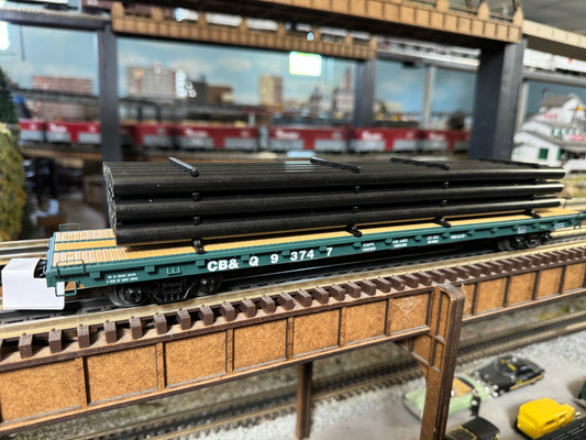MTH 20-95573 - Premier - 60’ Flat Car "Burlington" #93745 w/ Pipe Load (Black) - Custom Run