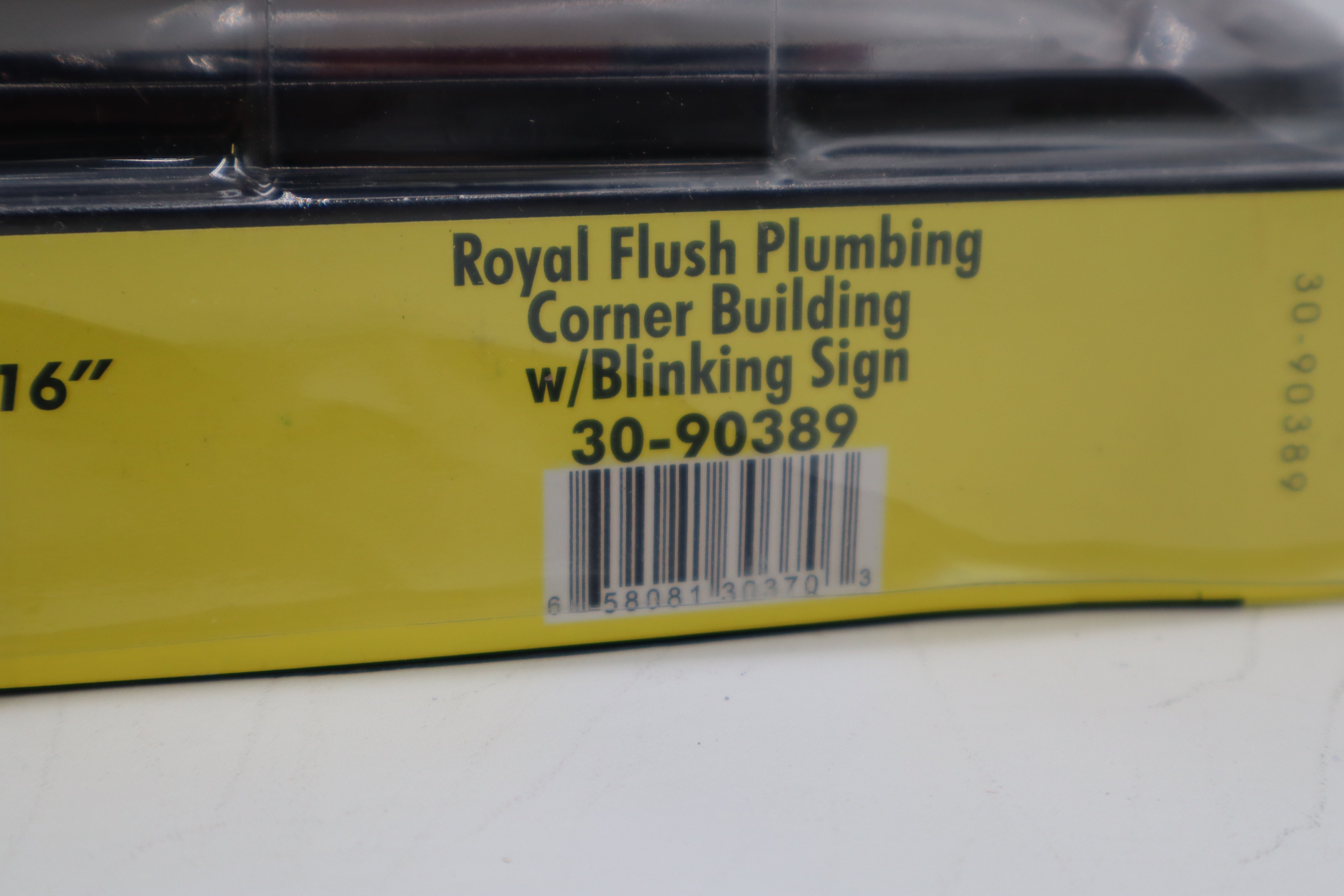 Rail King 30-90389 Royal Flush Plumbing Corner Building w/ Blinking Sign-Second hand-M8491