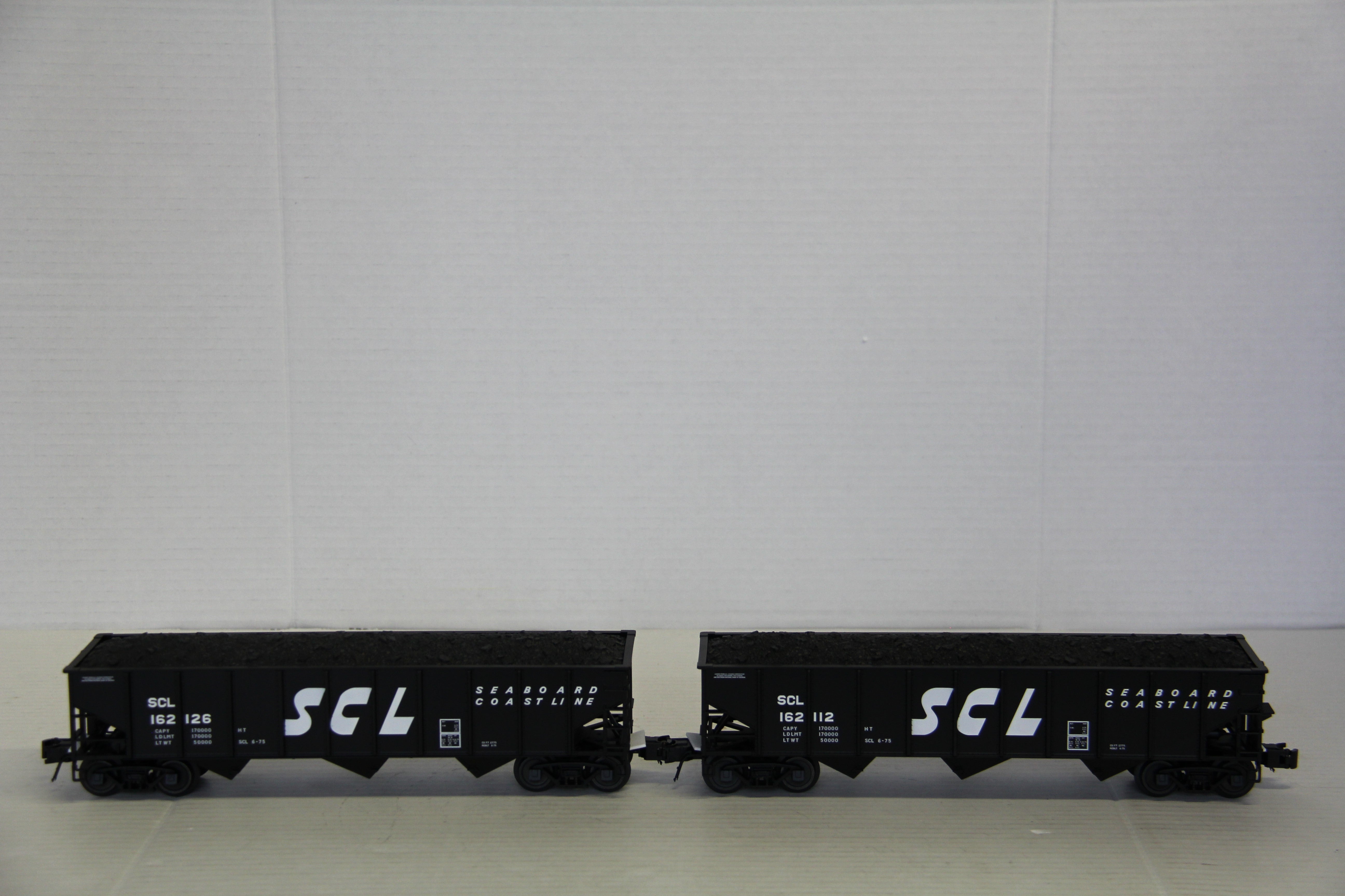 Atlas Trainman #2001832-1 & #2001832-2 Seaboard Coast Line TM 70T Hopper 2 Set-Second hand-M7348
