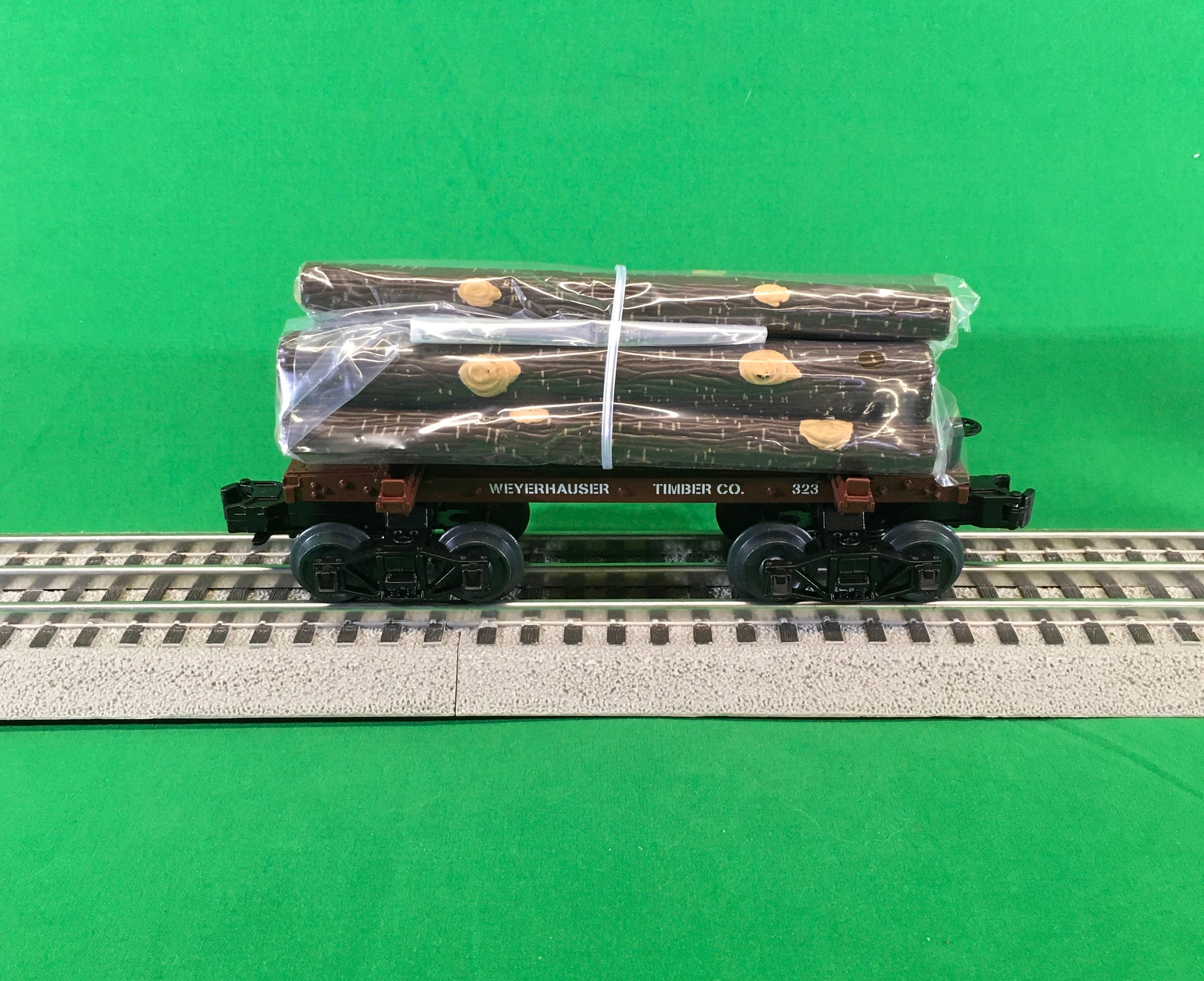 MTH 20-92328 - Skeleton Flat Car "Weyerhaeuser" w/ Log Load Set #2