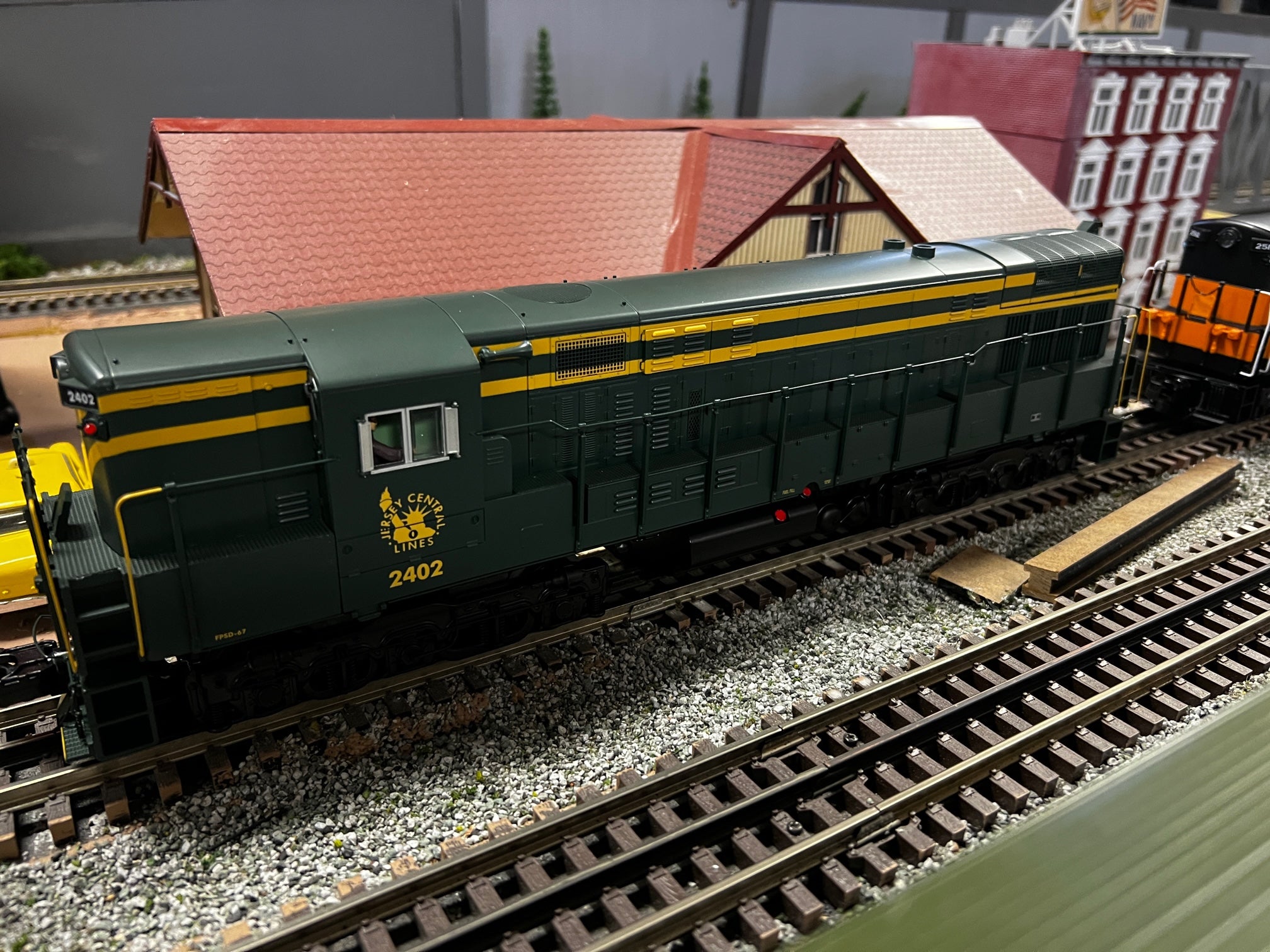 MTH 20-21647-1 - FM Train Master Diesel Engine "Jersey Central" #2406 w/ PS3 (Hi-Rail Wheels)