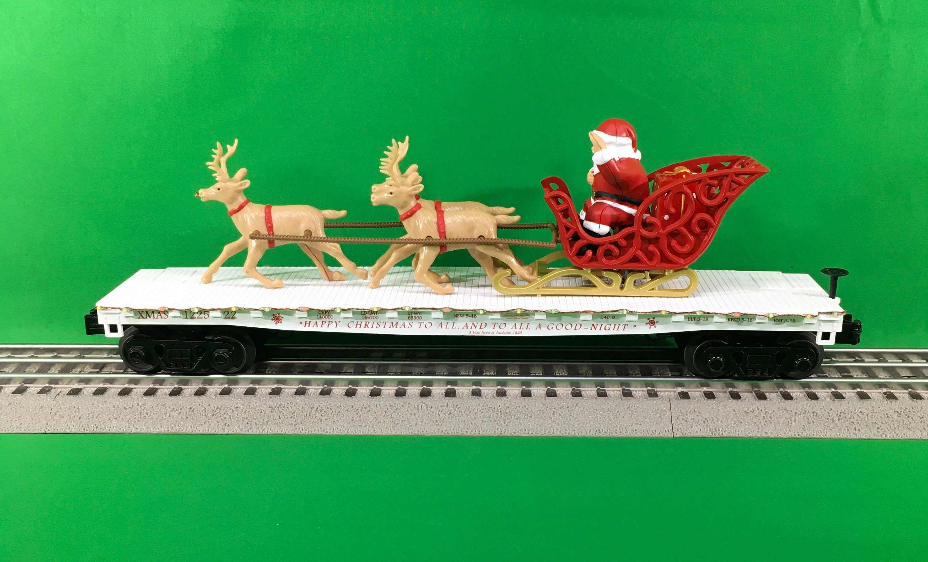 MTH 30-76862 - Flat Car "Christmas" w/ LED Lights, Santa Sleigh & Reindeer (White)