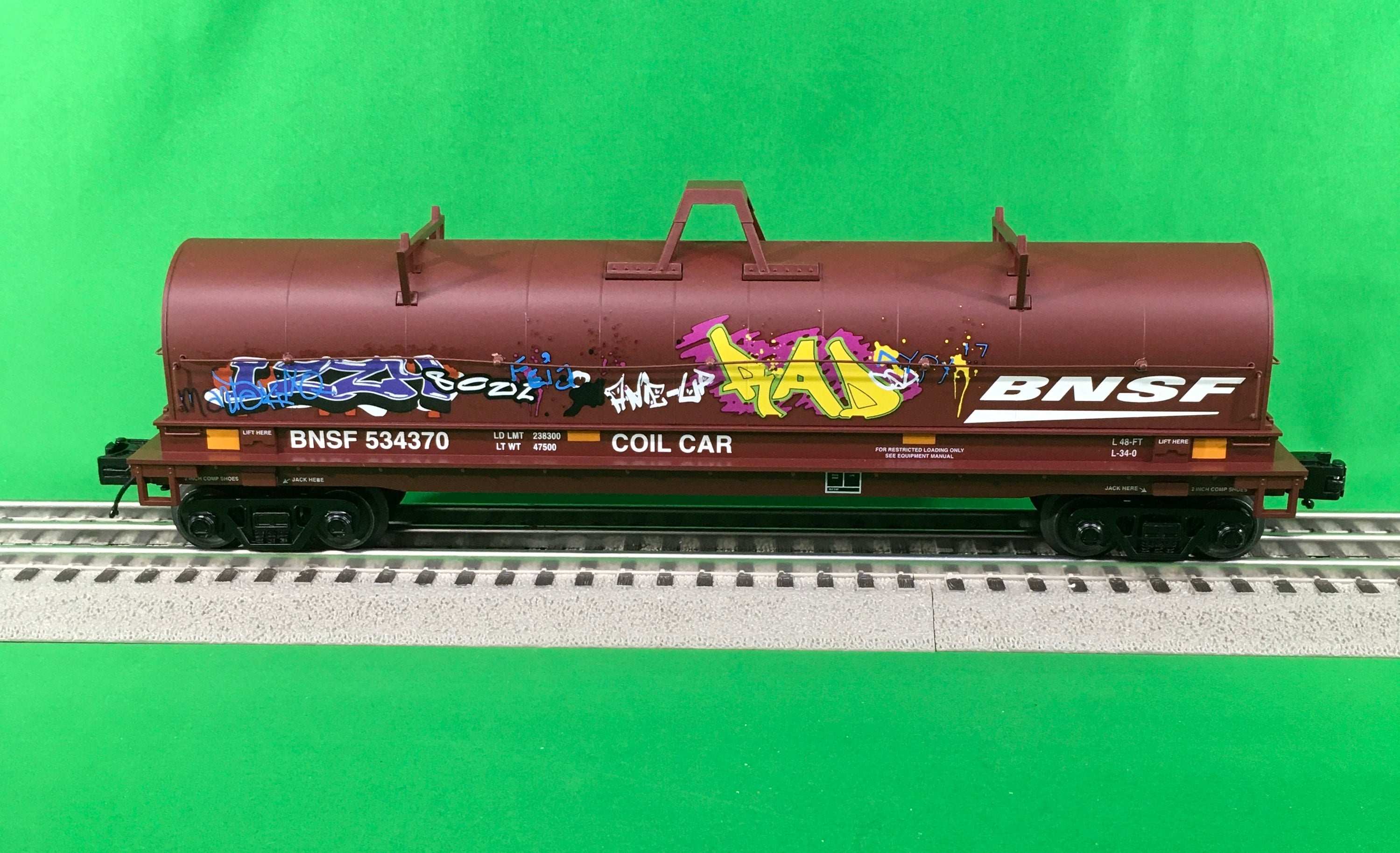 Lionel 2226520 - Coil Car "BNSF" #534370 w/ Graffiti
