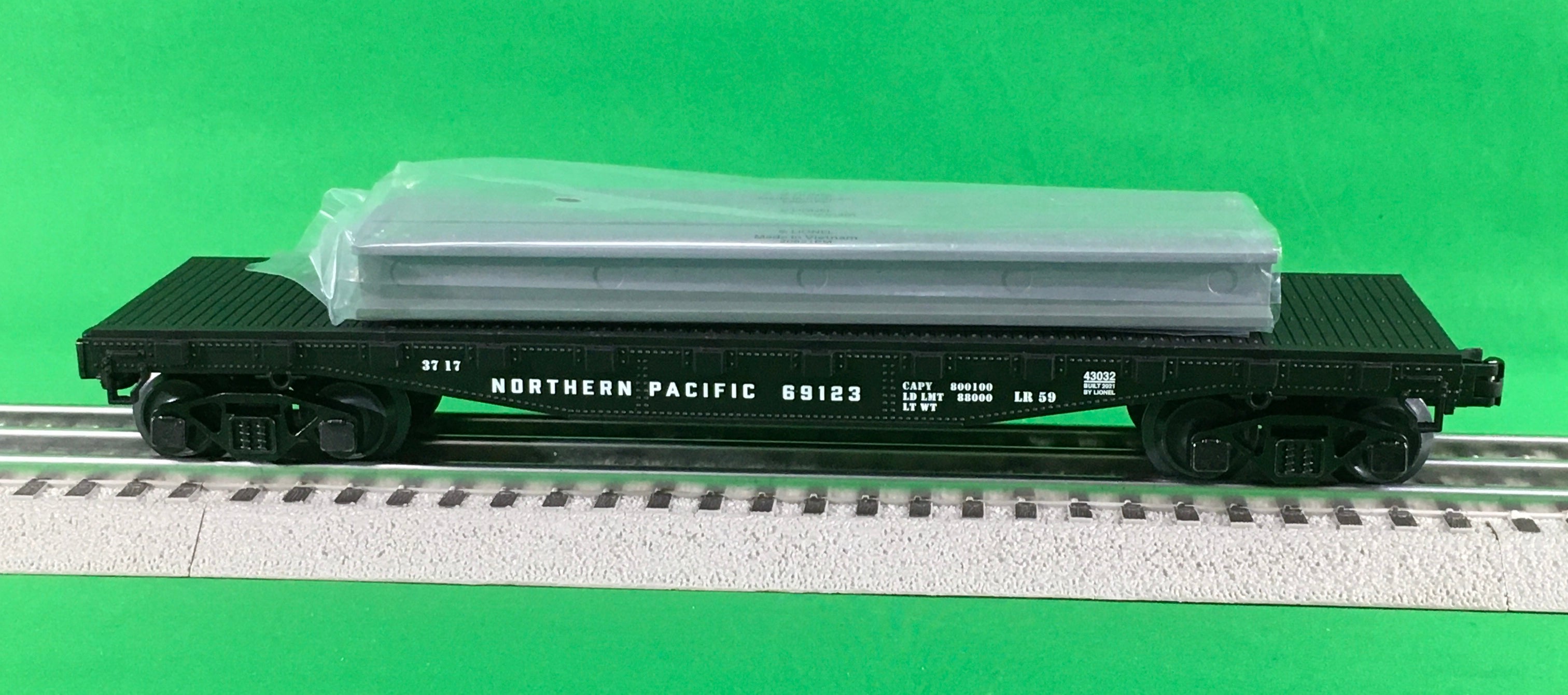 Lionel 2143032 - Flatcar "Northern Pacific" w/ Stakes #69123